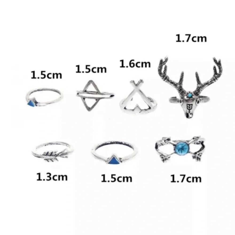 Set of 7 Silver Tone Rings